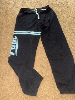 Black speckled Woman’s Victoria Secret PINK Sweatpants with Mint Accent